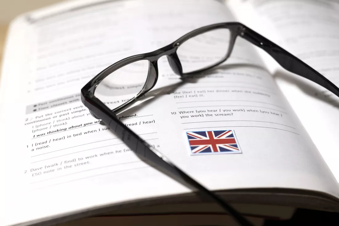 english-book-with-glasses-table