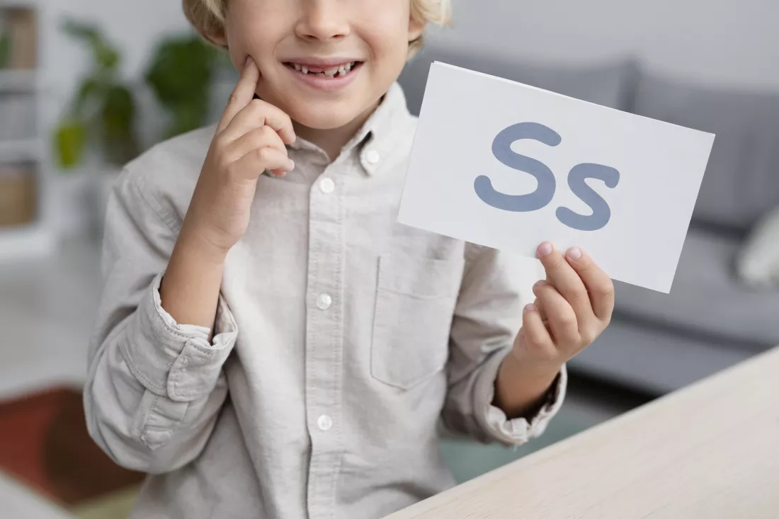 adorable-little-boy-doing-online-session-speech-therapy
